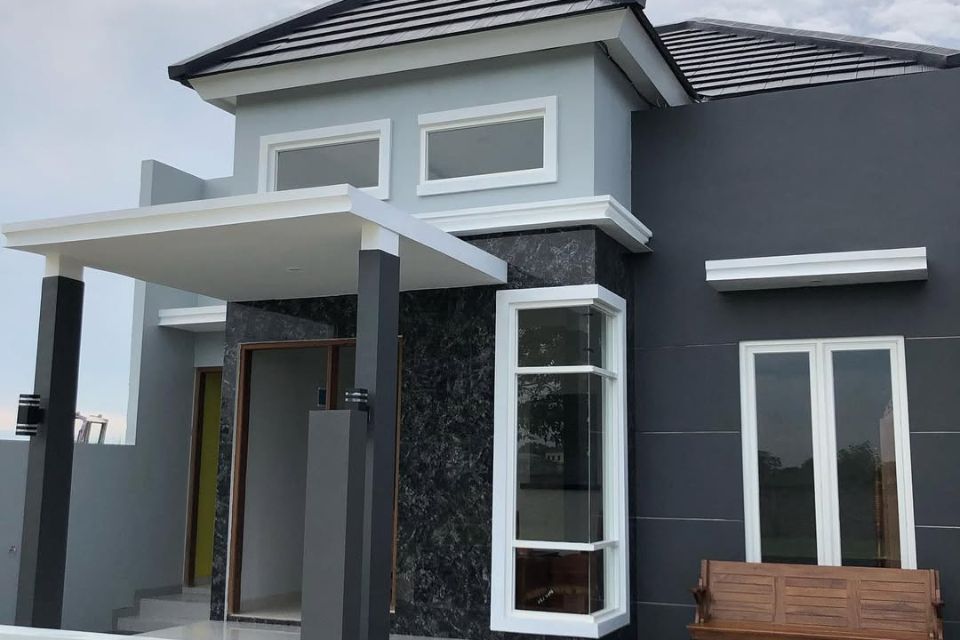 Rumah Minimalis Abu-Abu Putih dengan Aksen Batu Alam
